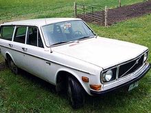 The 145 sits by my in-laws' barn after blowing the front main seal in August 2003