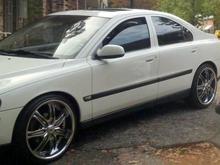 2003 volvo s60,2.4l,95k miles,20inch lexani rims,cold blue h.i.d. headlight kit,red calipers behind 