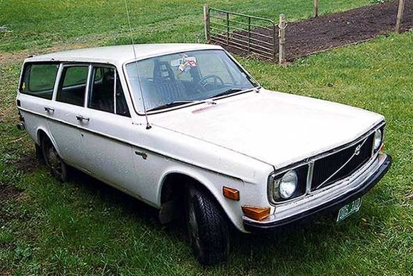 The 145 sits by my in-laws' barn after blowing the front main seal in August 2003