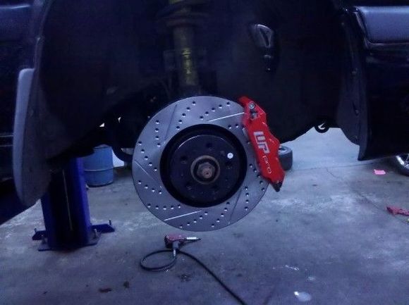WP Pro 6 pot calipers on S60R drilled and slotted rotors.
