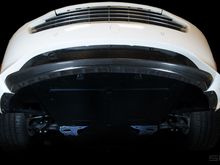 Carbon front lip is protected so are the sides.  The worst sound in the world is that crunch sound when you pull up to far forward.