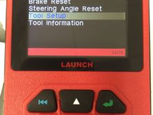 If in Chinese, scroll down to second to last item and press green return button.