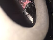 Leak. This is the connection to the coolant expansion tank which is at the rear of the tank towards the bottom but physically on the side