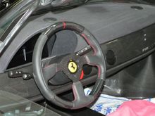 MAcarbon Ferrari F50 wheel, top and bottom carbon, with red stripe, and red stitching