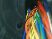 Poor quality scope photo of firewall grommet and nipple, '06 LHD DB9 Volante