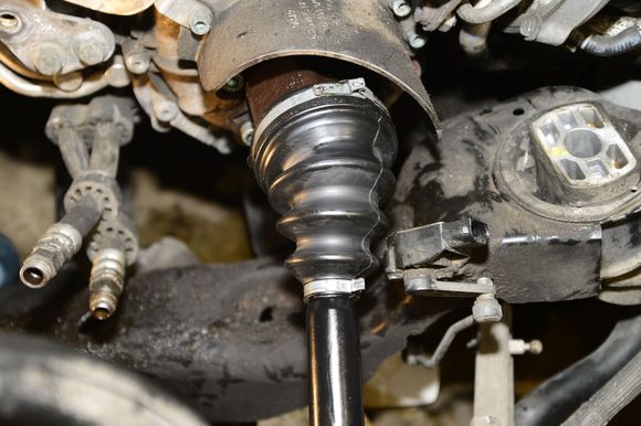 Smother the rollers with CV grease and fill the casing and boot with the rest of the CV joint grease supplied in the kit. Then install and tighten the clips on the boot and you are done. Easy Job when you have all the right tools :)