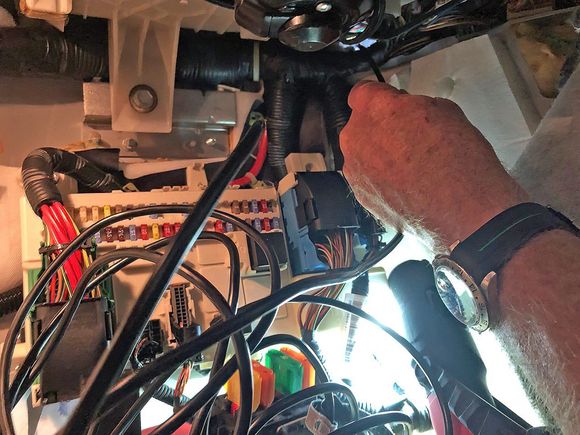 Zeroing in on a firewall grommet in an '06 LHD DB9 Volante