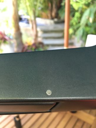 Does anyone know how to remove this little bottle cap pin so I can remove the interior door handle? Im getting a carbon fiber piece made.