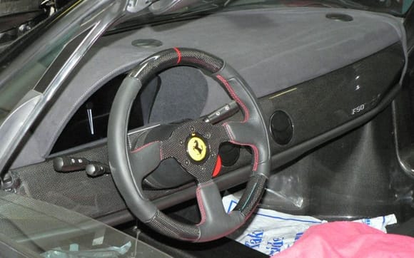 MAcarbon Ferrari F50 wheel, top and bottom carbon, with red stripe, and red stitching