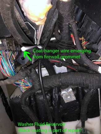 Passenger-side front wheel-well of an '06 LHD DB9 Volante with liner removed