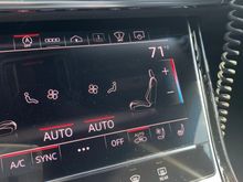 Lower MMI and grayed out rear sunscreen while in motion. 