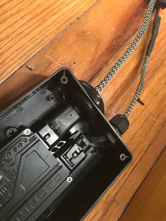 Had to snap off the clip on the output in order to remove and flip the grommet.