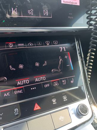 Lower MMI and grayed out rear sunscreen while in motion. 