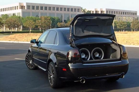 Flow Master Exhaust, Blacked Out Tail Lights and 2 12" Subs