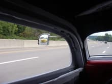 My friend and co-worker Joe took this cool photo of me in my Camaro passing him on Interstate 93 on our way home from the show.  Joe and his wife, Terry, are driving their 1934 Ford hot rod which won the Nostalgia Award at the show.