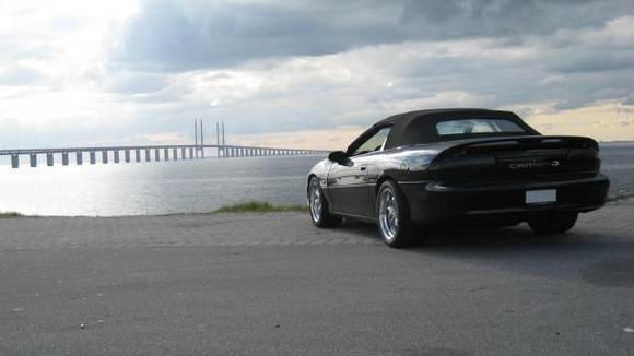 Bridge to Copenhagen, Denmark behind the car