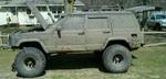 1998 Cherokee 8.5" Long Arm 35" Goodyear mtr's, trail pig intake.