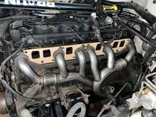 Installing a new exhaust mani. I had this sitting on a shelf for 2 years. If I’m not mistaken, the large springs welded to the tubes are designed to dampen/redistribute the vibration that causes that cracking issue. 