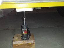 Because the stiffener is not welded, the slider will droop below the pinch lip seam. I propped it up to install the hangers.