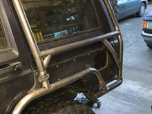 Here’s how I did the sides. The braces provide triangulation without interfering with the window or gas cap.