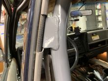 This bracket bolts to the upper seatbelt mount. Had to trim the plastic trim a bit.