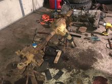 Axle disassembly. note the transmission/transfer case in the background.