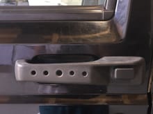 The drilled out door handles!