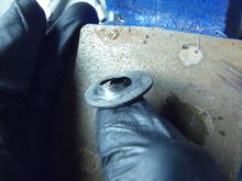 This is the washer for the bolt through the track bar bushing.  It saw quite a load, eh?