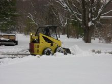 Plowing with the new machine. Pushes snow like no tomorrow. Need to get familiar with the controls. It's a lot different than the Tractor.