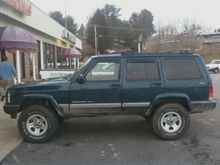 Rear lifted more after the 2 1/2" rough country adjustable shackles.