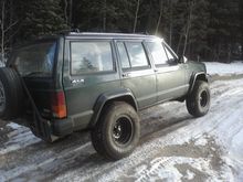 Out on a trail with the new tires and lift kit. Love how the sun is reflecting off of the XJ.