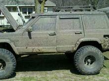 1998 Cherokee 8.5" Long Arm 35" Goodyear mtr's, trail pig intake.