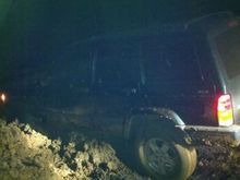 His half way out of the mud