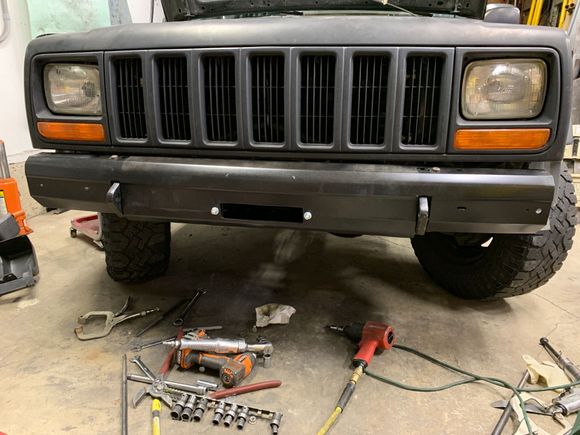Now it fits. The fairlead will bolt to the front of the bumper. This Custer is eventually going to upgrade this bumper. Otherwise we would have welded a piece back in to fill the gap caused by the slice and make it totally right.