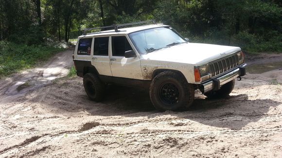 2wd stock w/ cut fenders n 31's