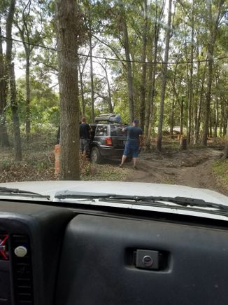 This bone-stock WJ did great on the stock course, except this part on the last day. Little mud portion that everyone had rooted up. Ended up pulling his front bumper off when I pulled him out. So I lent him a few bungee cords.