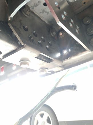 Drilled the top inside and welded on bosses onto the frame to bolt them on with M12 hardware. 