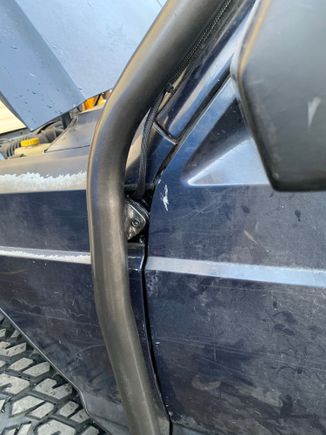 The wires from the cb antenna and light bar go in at the cut out.