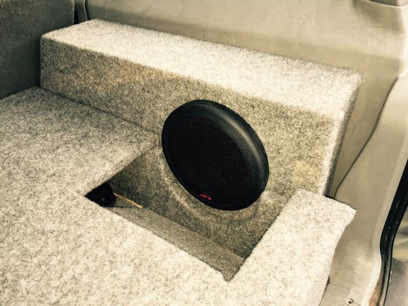 It doesn't look the best but it allows the bass to not reflect of a wall right infront of the subwoofer and also allows the amp some air