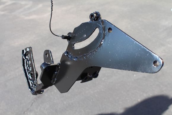 24 hours (yes 3 days of work)of labor later, here is the steering bracket that I fabbed up.
It was a mind teaser for sure!!