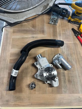 New upper rad hose, thermostat and housing, & Mopar water pump 