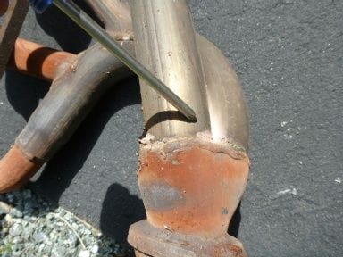 Second cracked area in old manifold