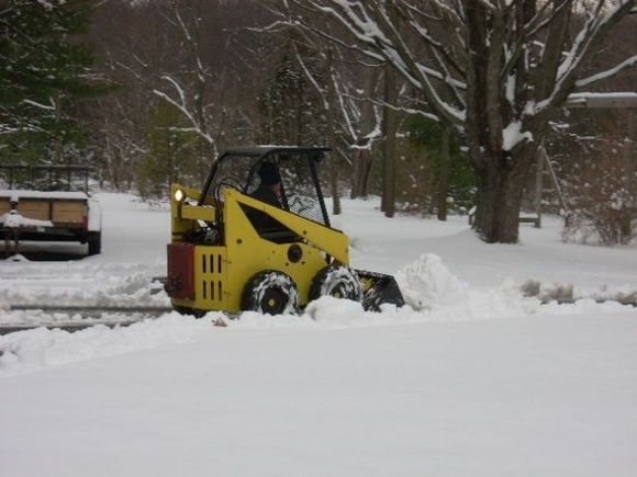 Plowing with the new machine. Pushes snow like no tomorrow. Need to get familiar with the controls. It's a lot different than the Tractor.