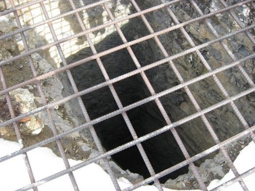 Believe it or not, there's a Jeep at the bottom of this old mine about 100 feet strait down!