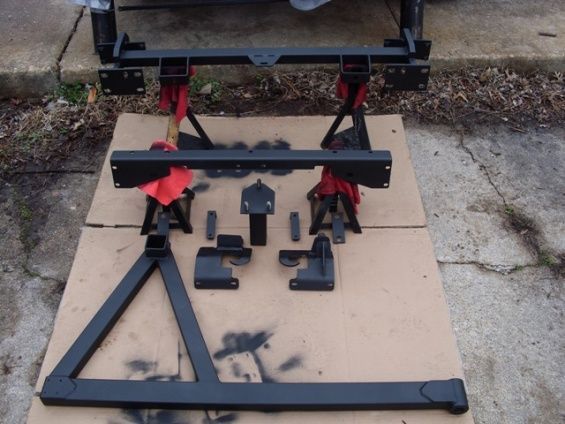 Detours send you everything assembled so you know which bolts go where and primed flat gray.  I went with a flat black top coat to match the trim on mine.