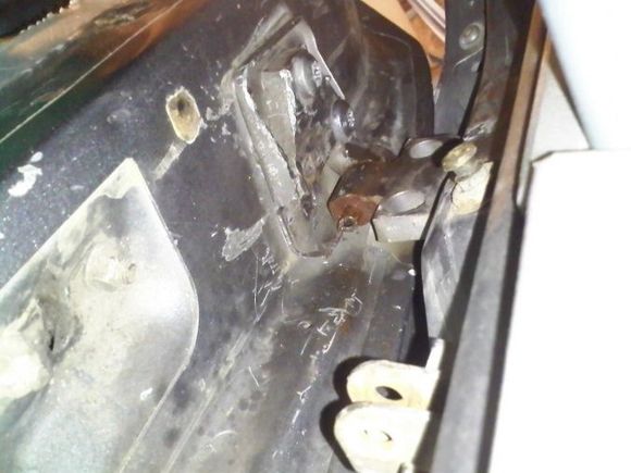 View of bottom of upper hinge.