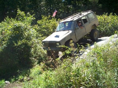 Coming Down his rear wheels start to come off the ground.. yikes