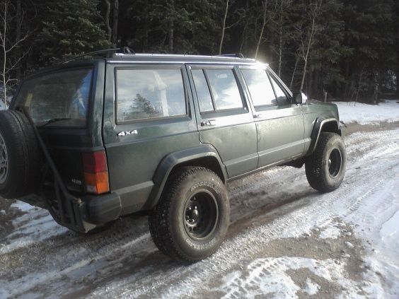 Out on a trail with the new tires and lift kit. Love how the sun is reflecting off of the XJ.