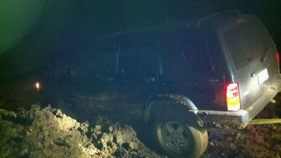 His half way out of the mud