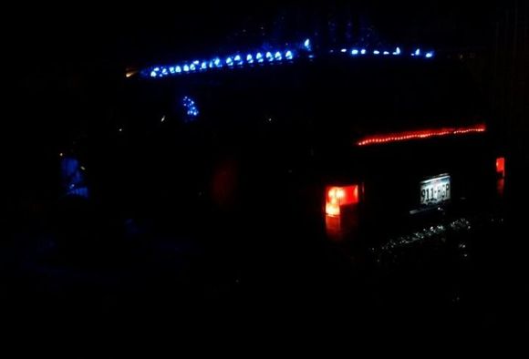 Xj decorations - rear at night with the Christmas lights on.